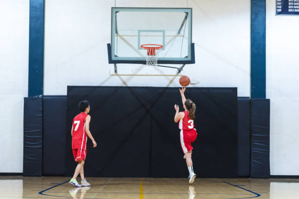 istock Co-ed high school basketball practice 1020780192