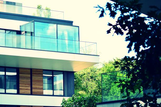 istock Modern apartment building exterior. Retro colors stylization 1020780672