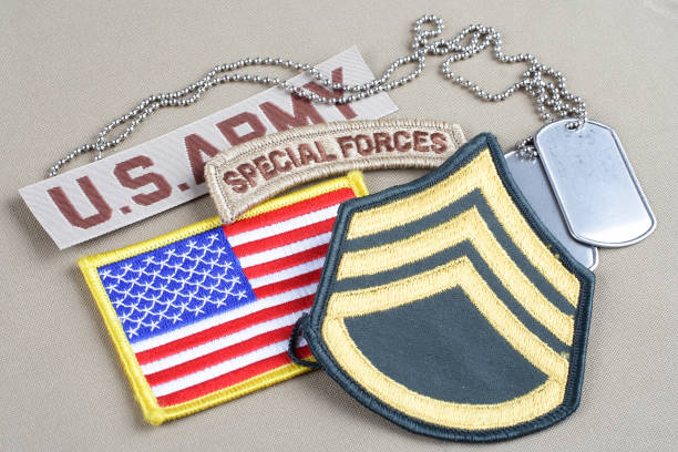 istock US ARMY Staff Sergeant rank patch, special forces tab, flag patch and dog tag 1020780710