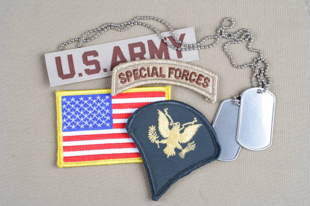 istock US ARMY Specialist rank patch, special forces tab, flag patch and dog tag 1020784888