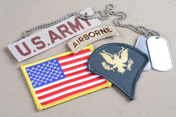 istock US ARMY Specialist rank patch, airborne tab, flag patch and dog tag 1020784958