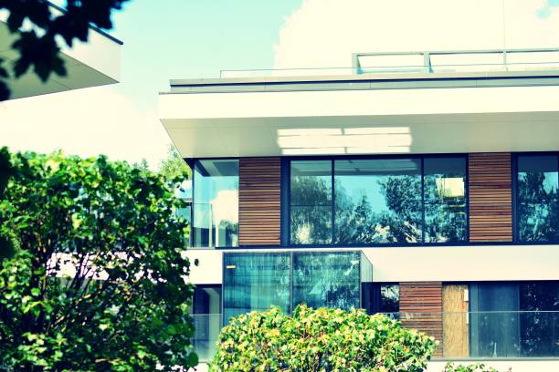 istock Modern apartment building exterior. Retro colors stylization 1020788298