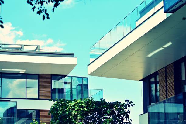istock Modern apartment building exterior. Retro colors stylization 1020788368