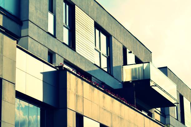 istock Modern apartment building exterior. Retro colors stylization 1020798862