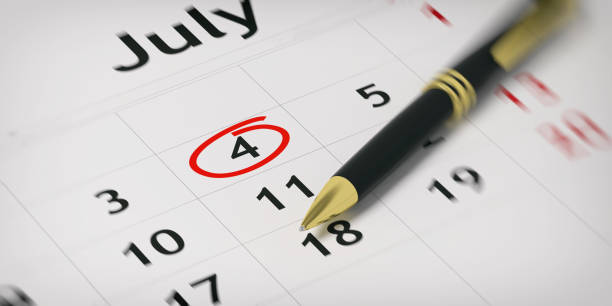 istock Ballpoint pen on a planner - Independence day circled. 3d illustration 1020803334