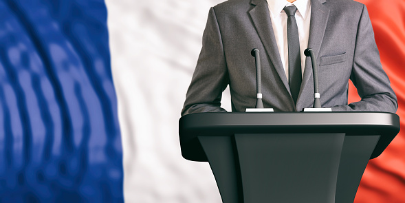 Businessman or politician making speech on France flag background. 3d illustration