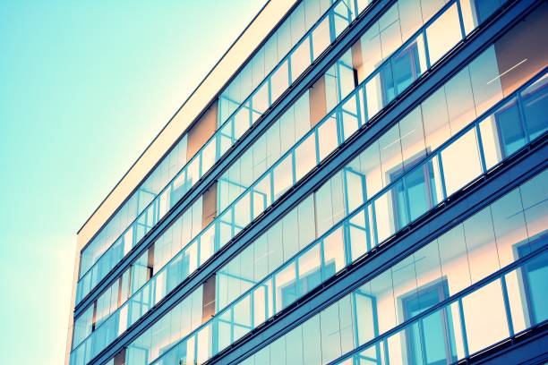 istock Modern apartment building exterior. Retro colors stylization 1020808300
