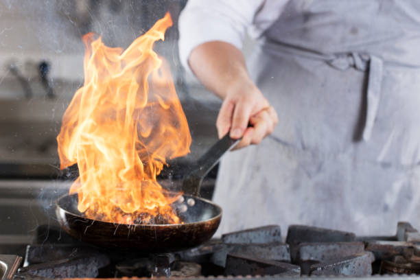 istock Burning lunch.Frying pan is on fire. 1020810956