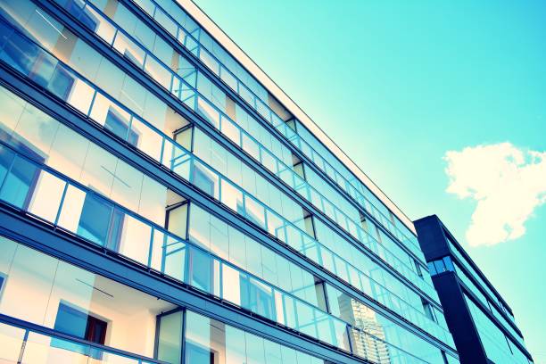 istock Modern apartment building exterior. Retro colors stylization 1020811490