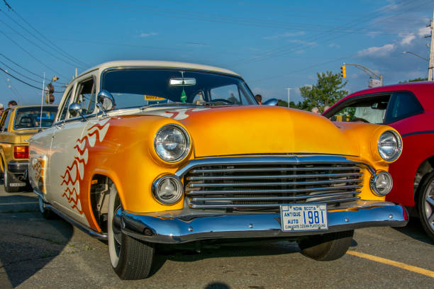 Customized 1952 Ford A mildy customized 1952 Ford on display at A&W summer weekly Thursday cruise-in, Woodside Ferry Terminal, Dartmouth Nova Scotia Canada - August 16, 2018. cruising hot rods stock pictures, royalty-free photos & images