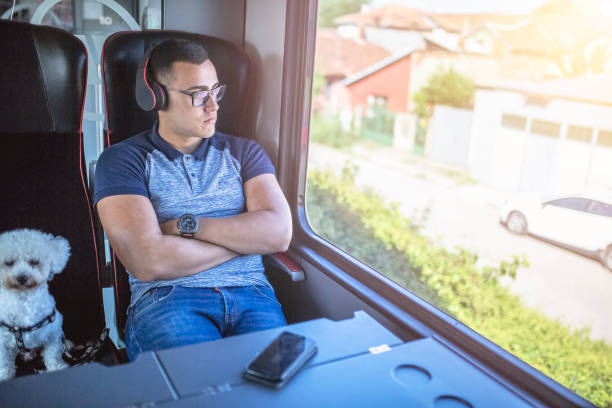 istock Young man traveling  by train 1020829002
