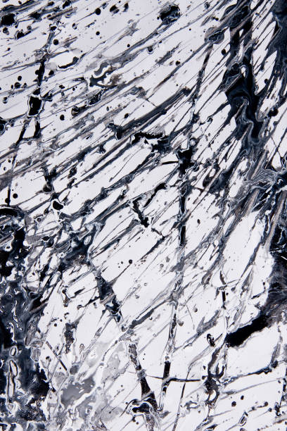 istock Abstract expressionism pattern. Style of drip painting. Black and white paint. 1020831844