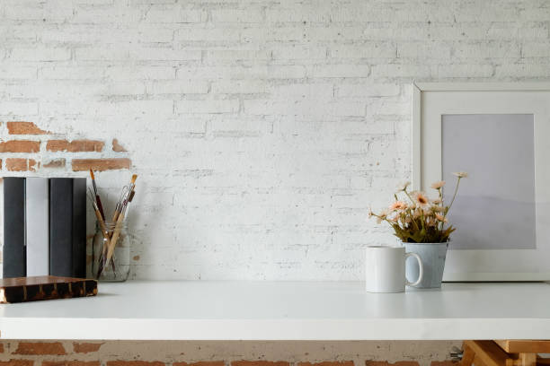 istock Loft desk mockup poster, vintage books and copy space. 1020837256