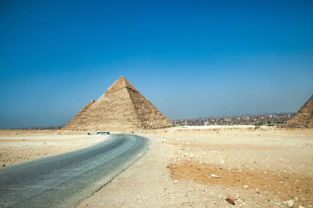 istock Asphalt Road Leading to Pyramids of Giza 1020846830