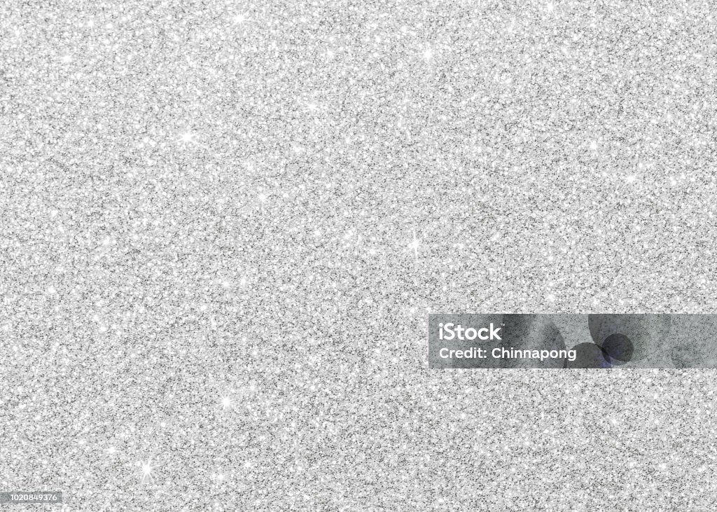 Silver glitter texture white sparkling shiny wrapping paper background for Christmas holiday seasonal wallpaper decoration, greeting and wedding invitation card design element Glittering Stock Photo