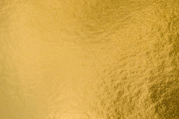 istock Gold foil leaf shiny wrapping paper texture background for wall paper decoration element 1020849390