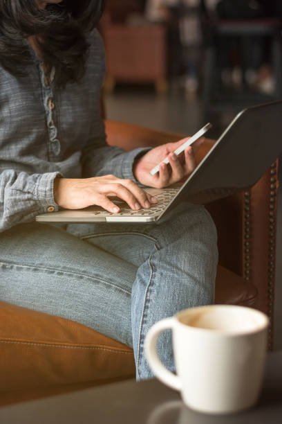 Digital lifestyle blog writer or business person using smart device working on internet communication technology