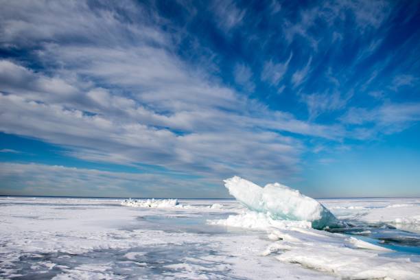 istock Blue turquoise ice heaves on a frozen lake 1020863082