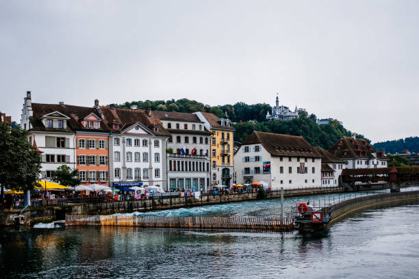 istock Buildings By River Against Clear Sky 1020880462