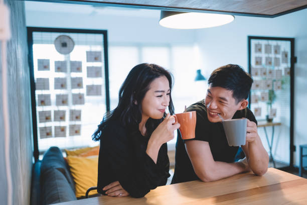 istock asian chinese couple at the dining chatting bonding time while having their coffee in the morning 1020897862
