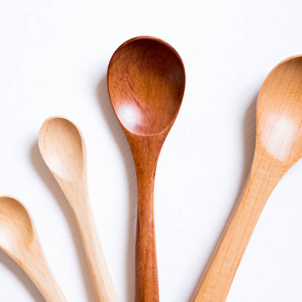 istock Wooden spoons on white background 1020915948
