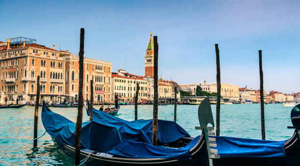 istock Traditional Gondola and San Marco Cathedral In Venice Panoramic 1020918610