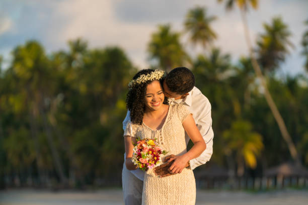 Honeymoon Honeymoon, Young Couple, Heterosexual Couple, Men, Women bride holding bouquet stock pictures, royalty-free photos & images