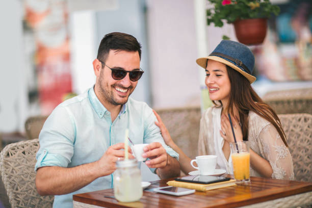 istock Beautiful couple having coffee on a date 1020945782