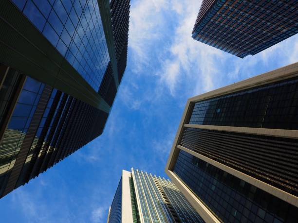 istock Looking up at business buildings 1020952896