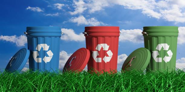 istock Recycle trash bins on blue sky and grass background. 3d illustration 1020958230