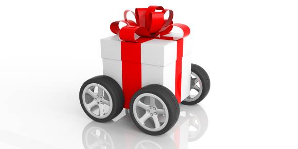 gift with red ribbon on wheels, white background. 3d illustration - car tire red new imagens e fotografias de stock
