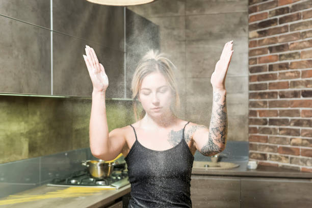 istock Woman in flour on the kitchen 1020966436