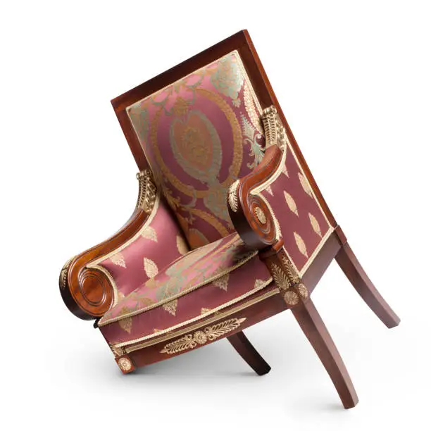 Photo of Antique armchair with broken leg on white background