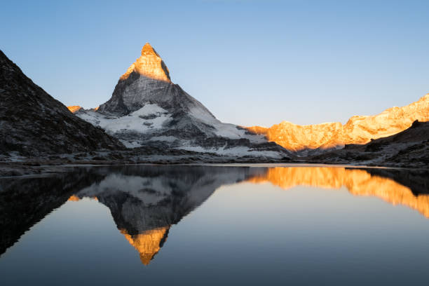 istock Reflection of the Matterhorn at sunrise, close view 1020994986
