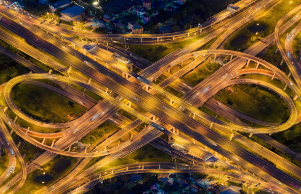 istock Aerial view highway road intersection for transportation, distribution import export or distribution background. 1021004490