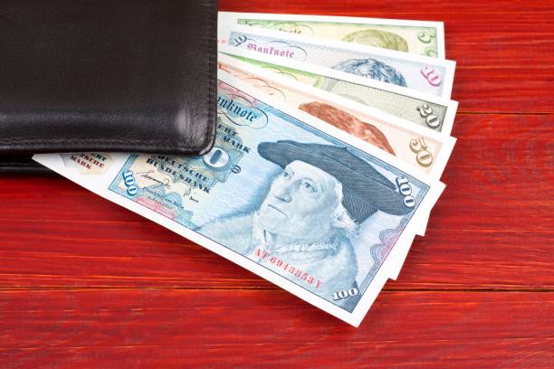 istock Old money from West Germany in the black wallet 1021006692