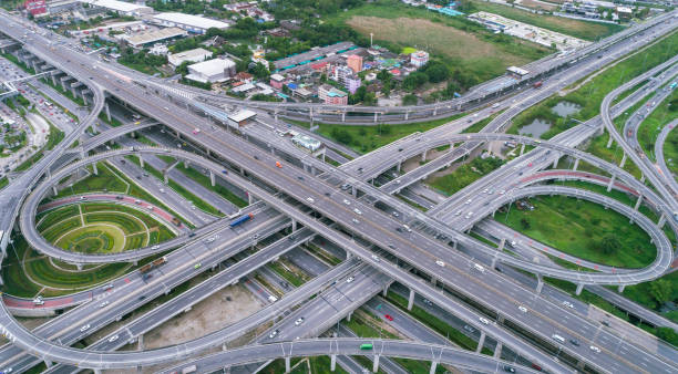 istock Aerial view highway road intersection for transportation, distribution or traffic background. 1021006722