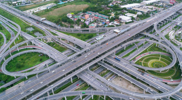 istock Aerial view highway road intersection for transportation, distribution or traffic background. 1021006734
