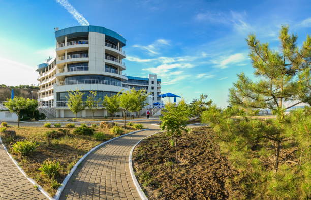 Black Sea Bugaz Hotel in Odessa Ukraine ODESSA, UKRAINE - 06.18.2018. Black Sea Bugaz hotel in Odessa Ukraine. "nNew luxury hotel resort in the area of the Carolino Bugaz beach odessa beach stock pictures, royalty-free photos & images