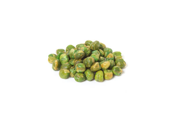 istock Green peas with salt isolated on white background 1021009278