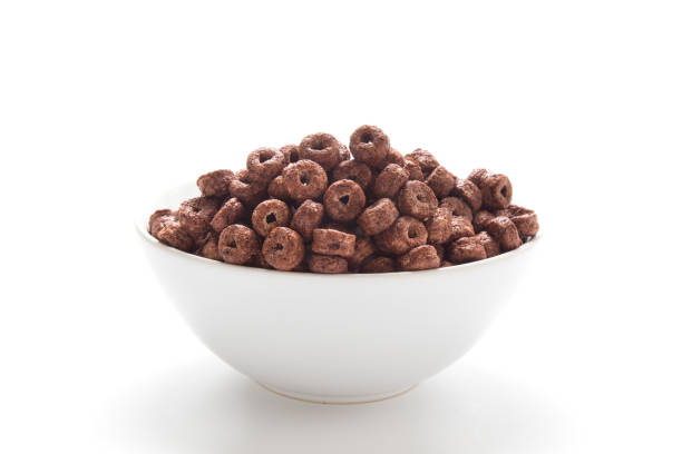 istock Corn flakes chocolate rings in a bowl isolated on white background 1021009284