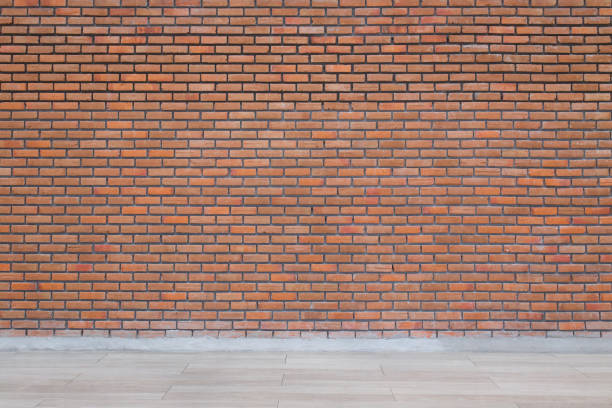 istock Interior room with brick wall and tile floor for background 1021009320