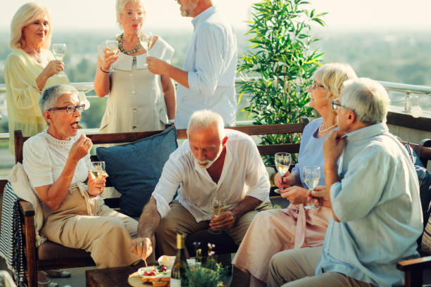 istock Senior Friends Having Fun On Rooftop 1021025612