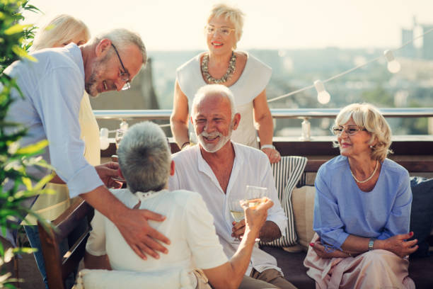 istock Senior Friends Having Fun On Rooftop 1021025670