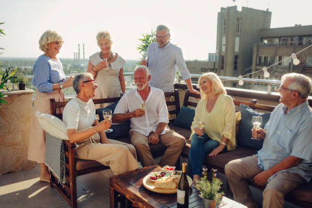 istock Senior Friends Having Fun On Rooftop 1021025732