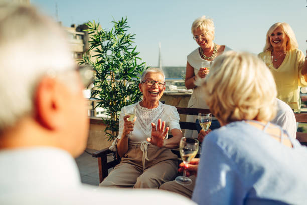 istock Senior Friends Having Fun On Rooftop 1021025852