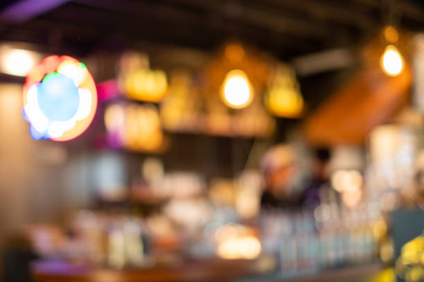 istock Blurred scene counter bar with light in coffee shop 1021031186
