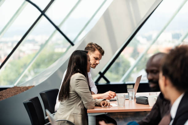 istock Business people in the office working together 1021031762
