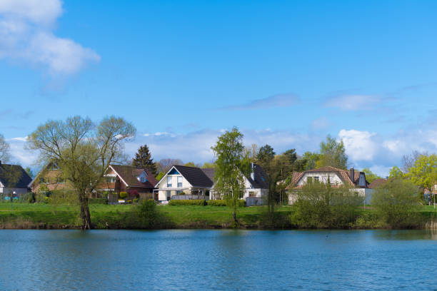 istock detached houses at a lake 1021035086
