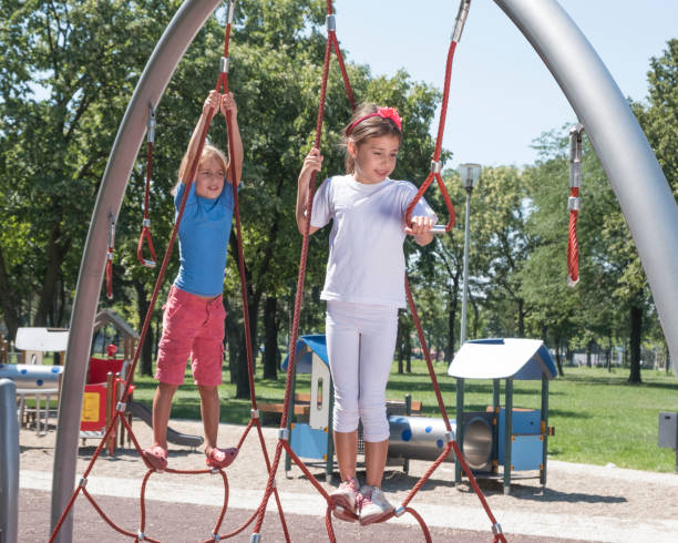 istock Kids playing at the playground 1021048644